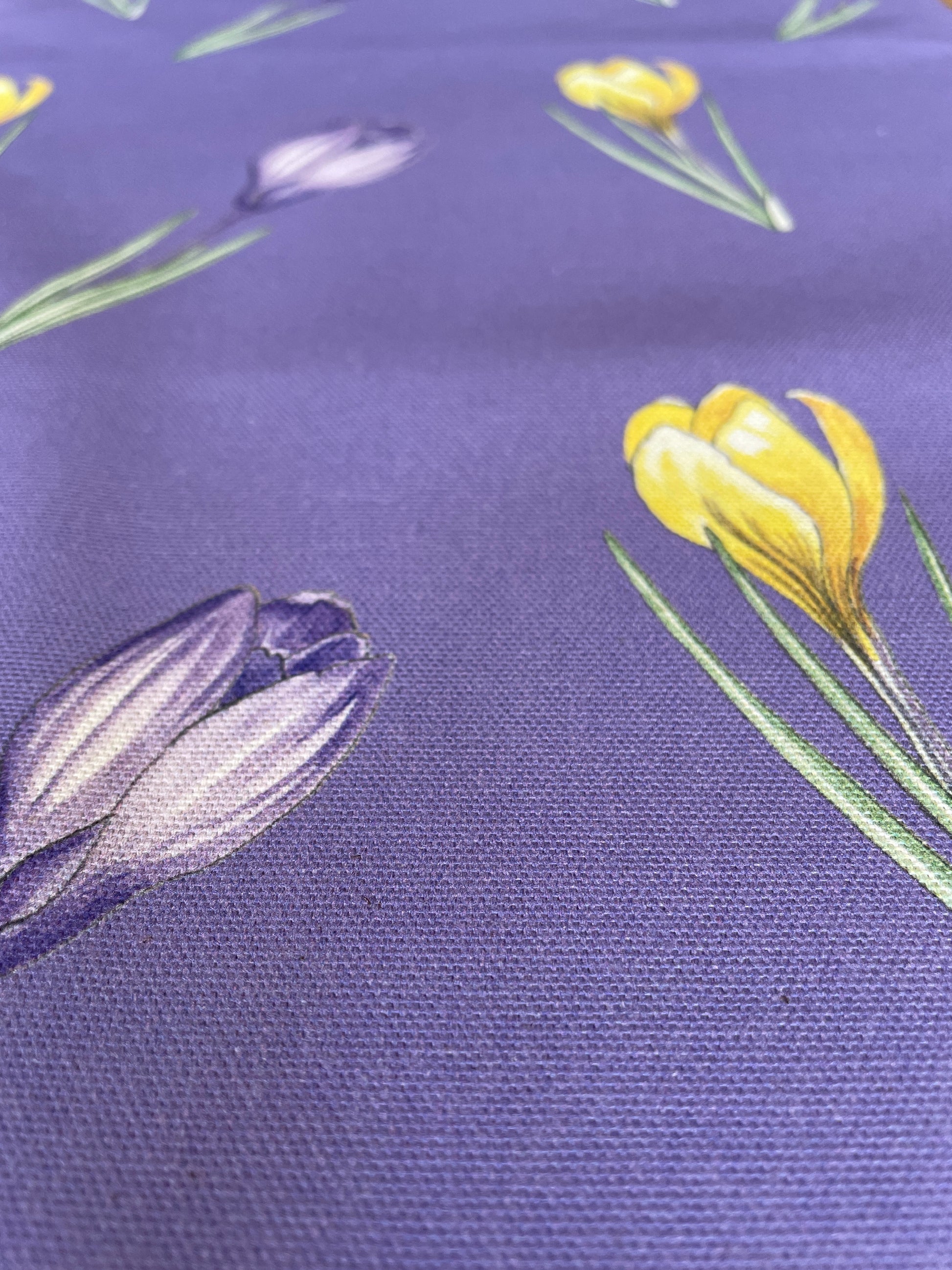 Close up of purple colour crocus design, organic cotton fabric.