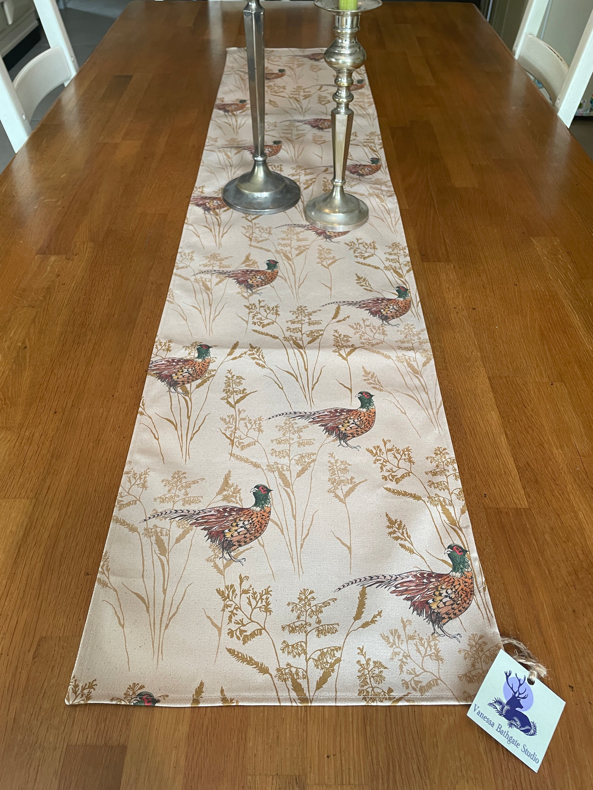 Mid table runner in organic drill cotton. In an original Pheasant and grass illustration design