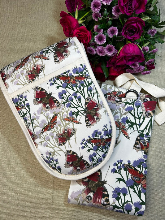 Oven glove and apron set with Scottish peacock butterfly design, cream background