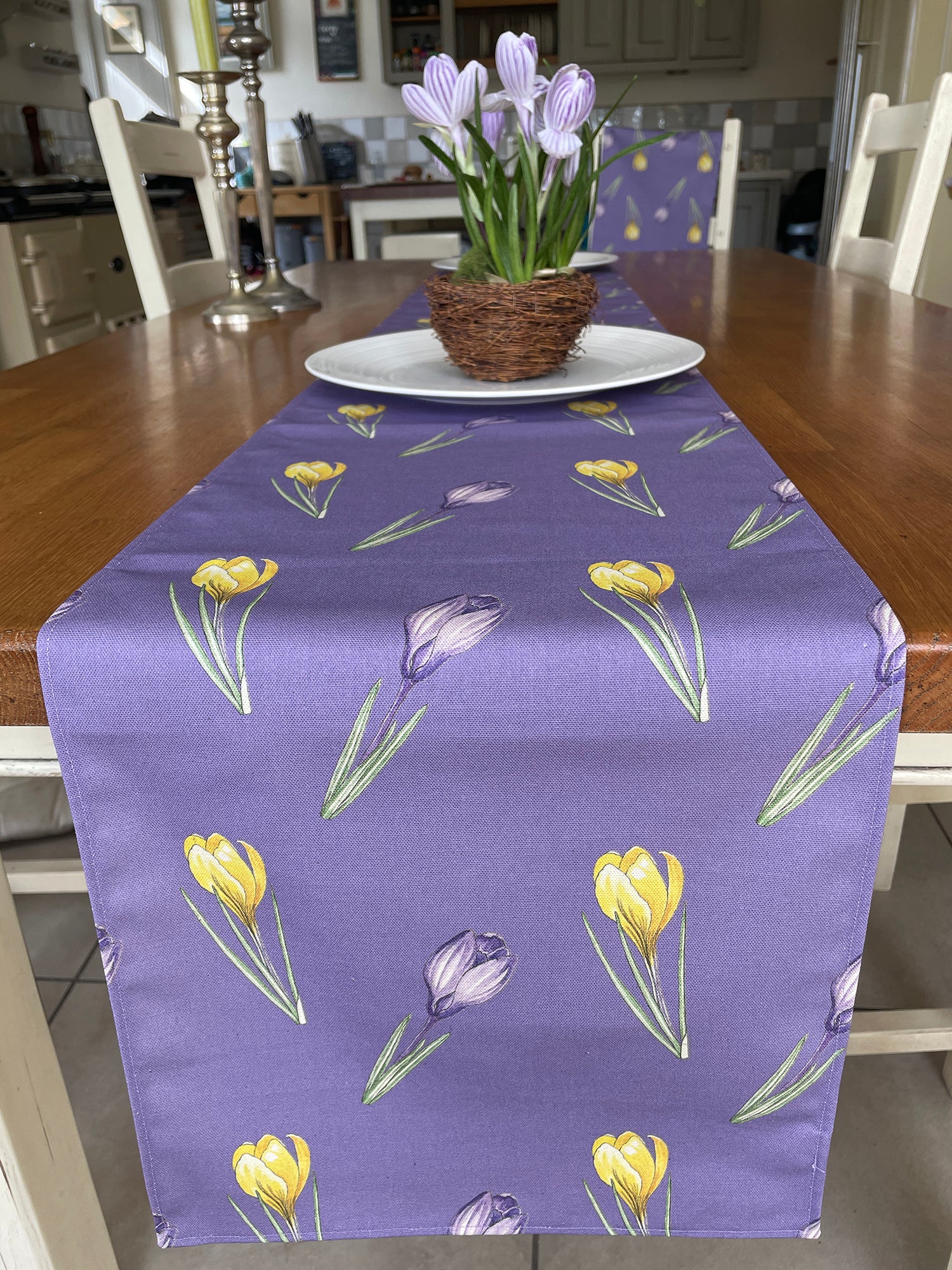 Crocus design, purple background, Long table runner hanging over table end.