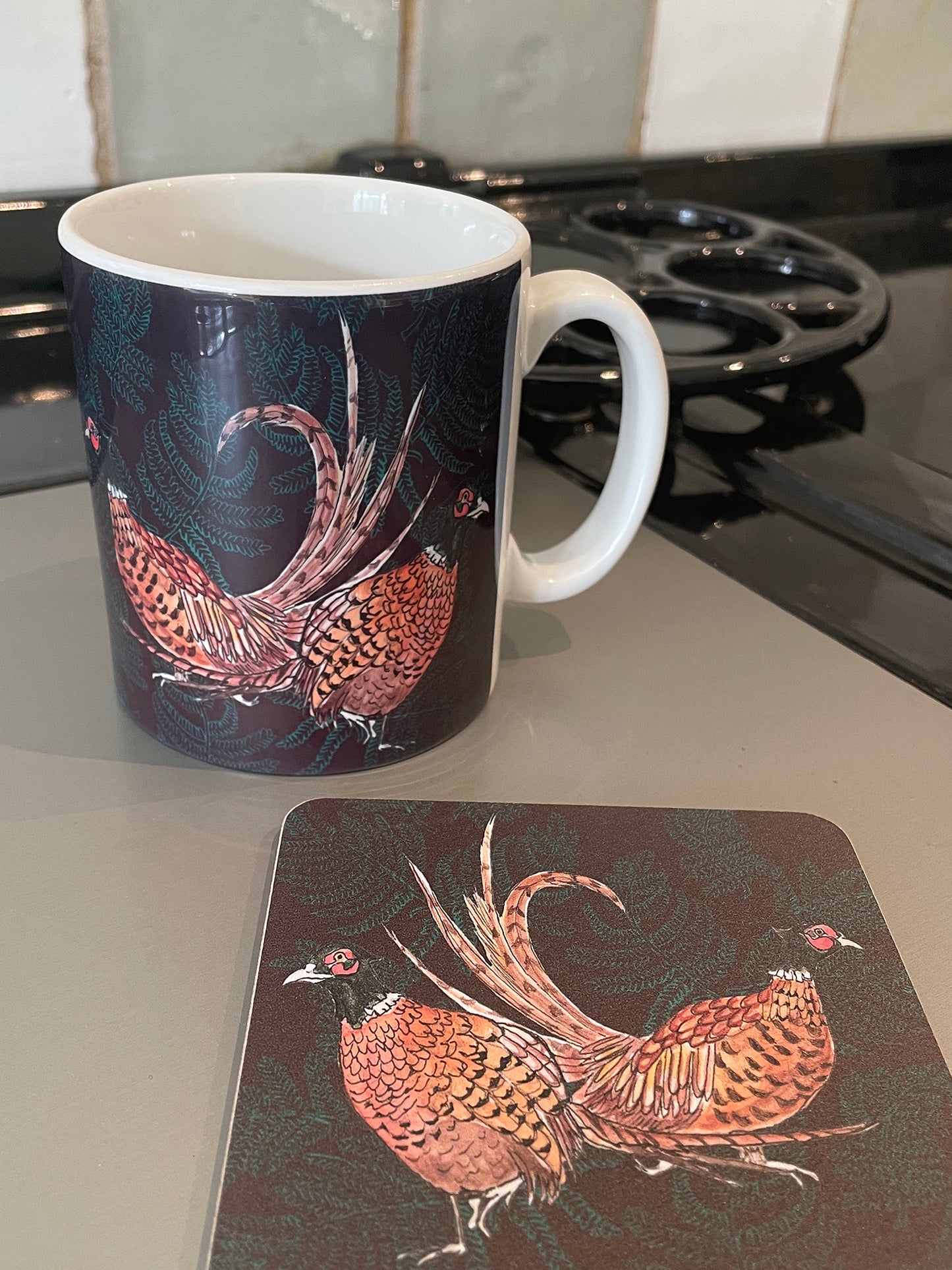 Ceramic mug with brown wrap pheasant design and matching coaster