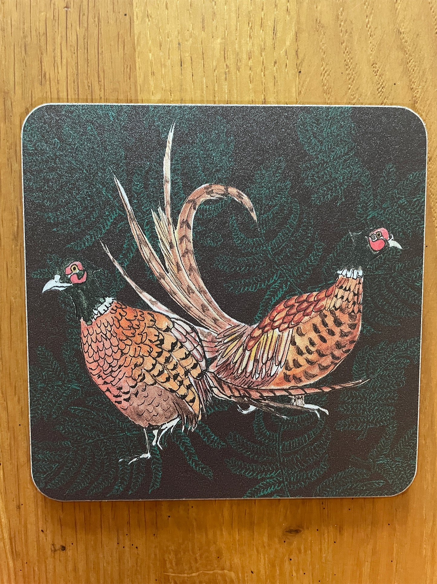 coaster with pheasant and fern design, brown