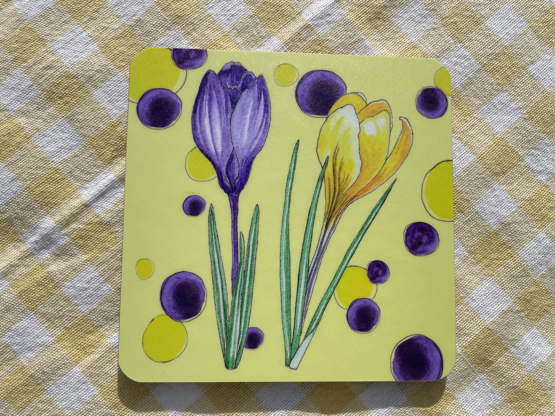 Yellow Crocus design cork based coaster or checked cloth